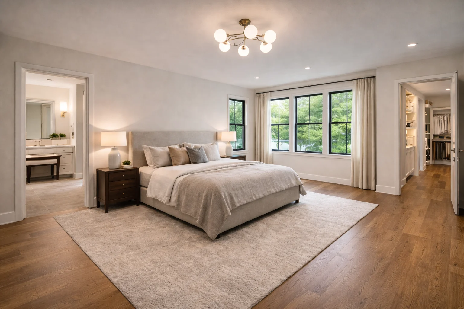 Modern, stylish bedroom with neutral colors and natural light